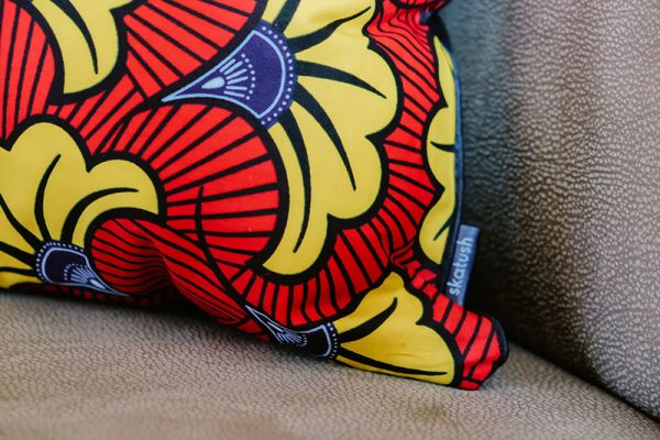 An African-inspired scatter cushion cover made using Ankara fabric by Skatush