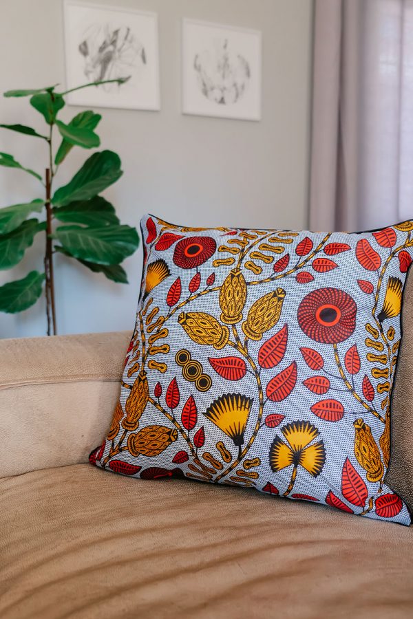 An African-inspired scatter cushion cover made using Ankara fabric by Skatush